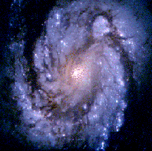 spiral galaxy M100 is shown here in pictures taken by the Hubble Space Telescope, after service mission