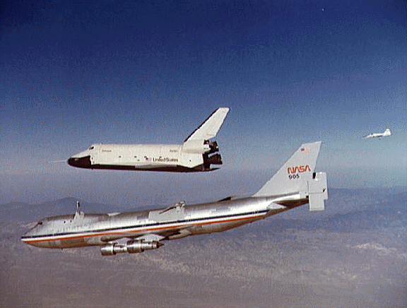 The Orbiter 101 Enterprise separates from the NASA 747 carrier aircraft to begin its first "tail-cone off" 