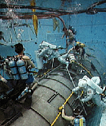 Practicing weightlessness in the underwater tank